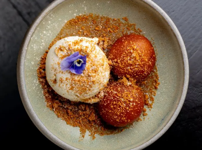 Cinnamon toffee pudding with caramel sauce and vanilla ice cream at Kerala Canteen Leeds