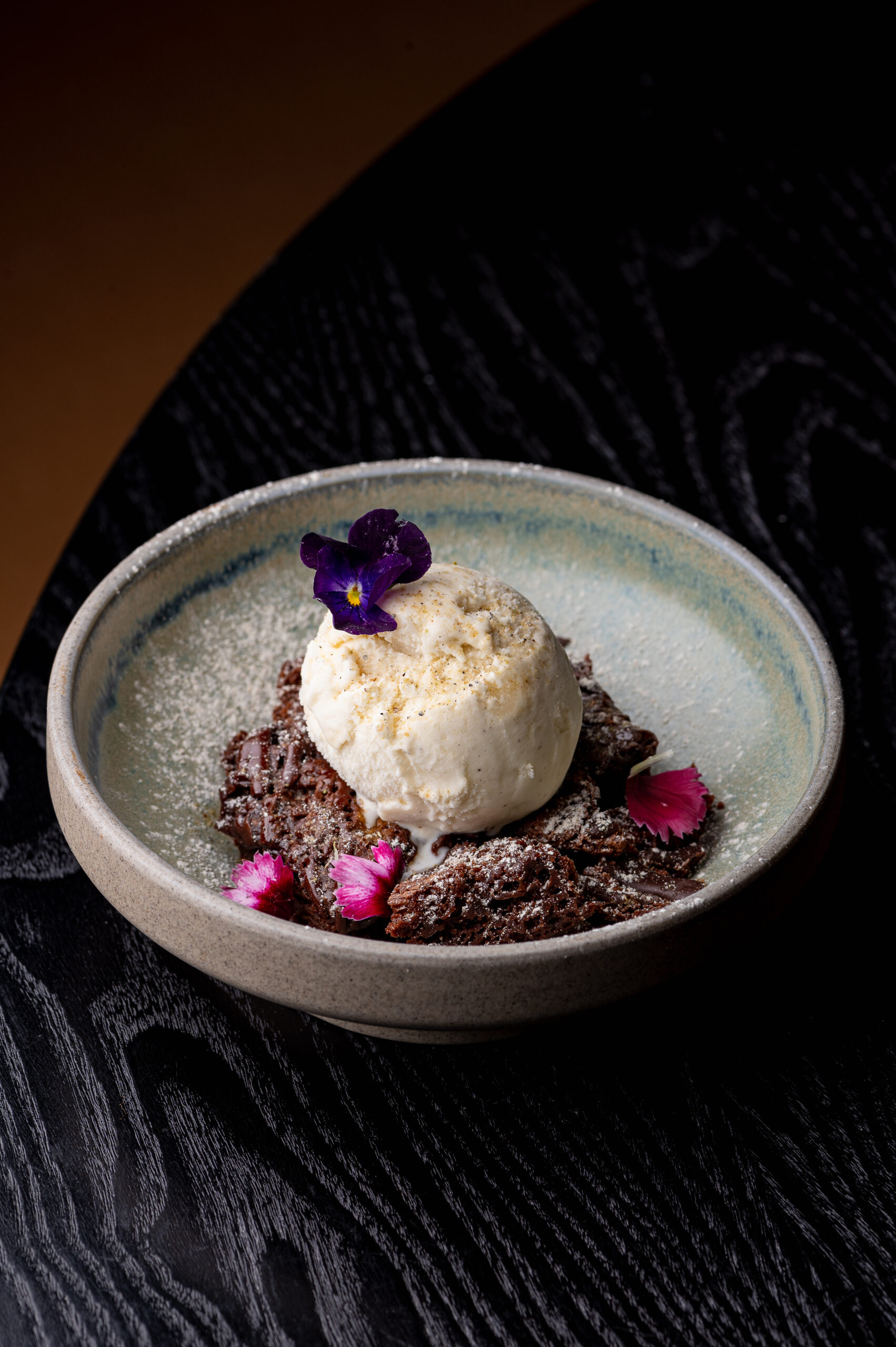 Cardamom chocolate brownie Leeds with vanilla ice cream