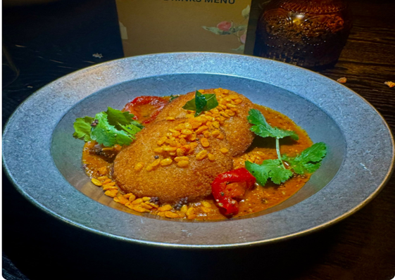 South Indian lentil fritter curry prepared with traditional spices