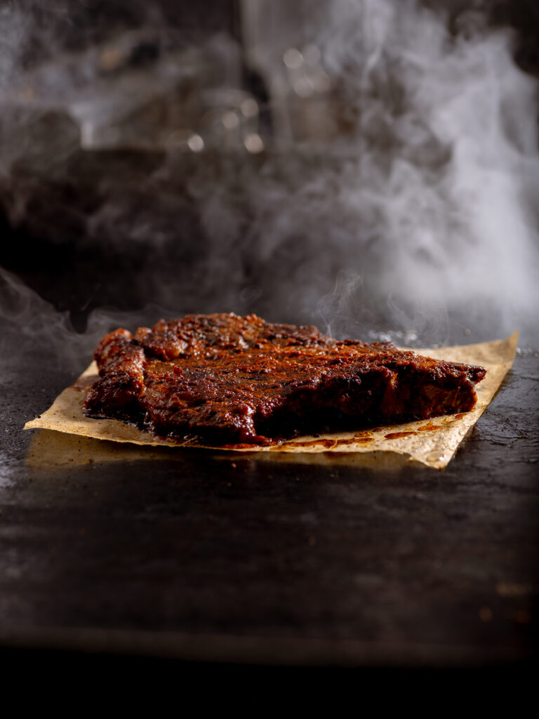 T bone steak Indian style Leeds with beef bone marrow curry and baby potatoes