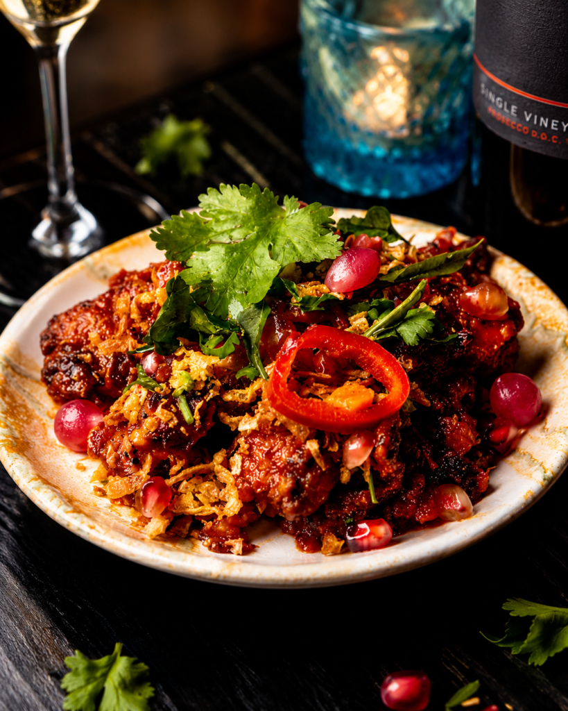 Chilli and tamarind cauliflower at Kerala Canteen Leeds with crispy fried coating and sticky glaze