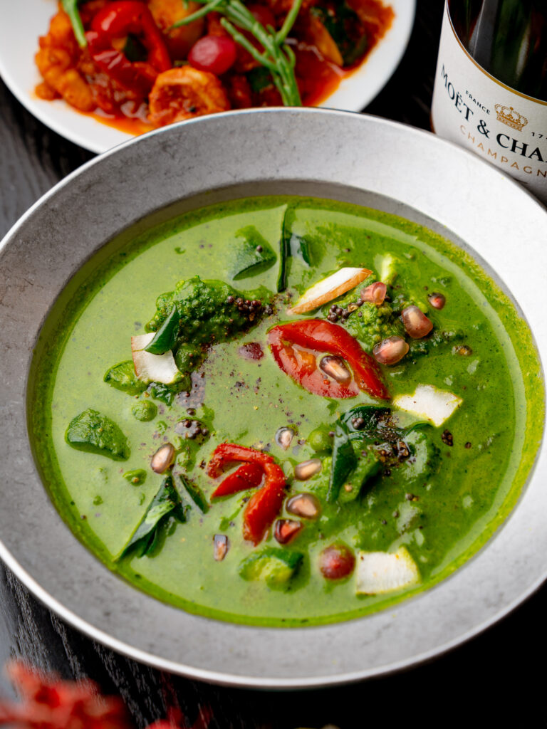 Green Seasonal Vegetable Korma at Kerala Canteen Leeds with broccoli peas beans and courgettes in Nilgiri Kerala sauce