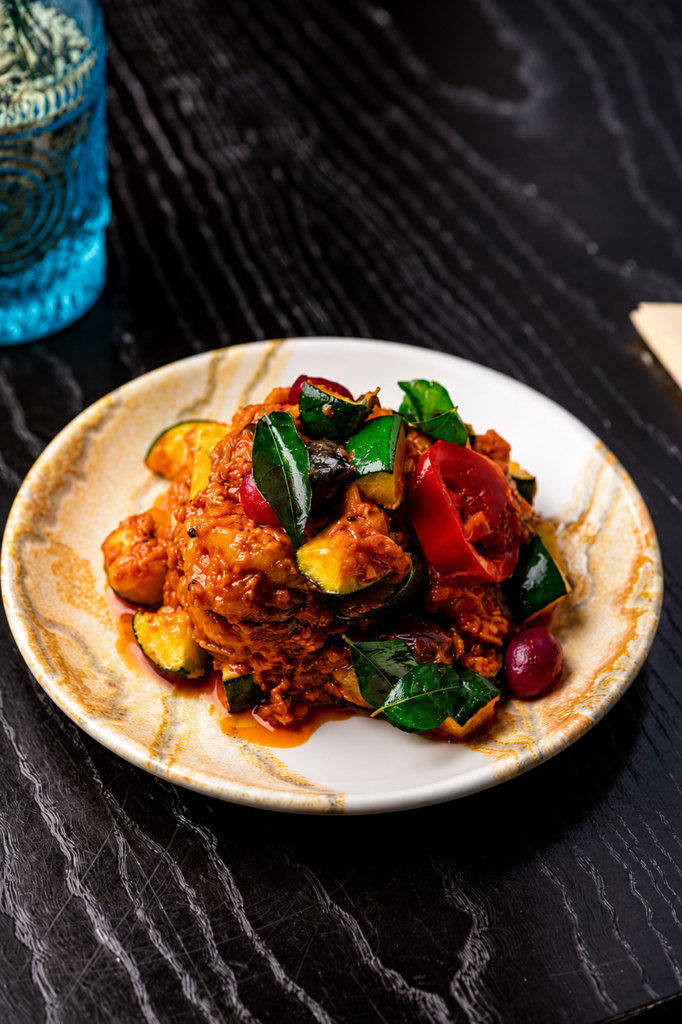 King Prawn and Courgette Masala at Kerala Canteen Leeds with tail-on king prawns in South Indian onion tomato masala