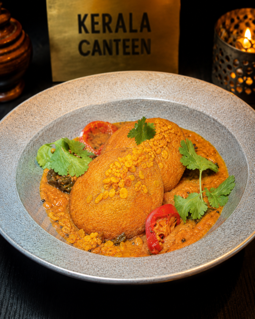 Crispy fried idli served in rich butternut sambhar with Mango Tango mocktail at Kerala Canteen Leeds