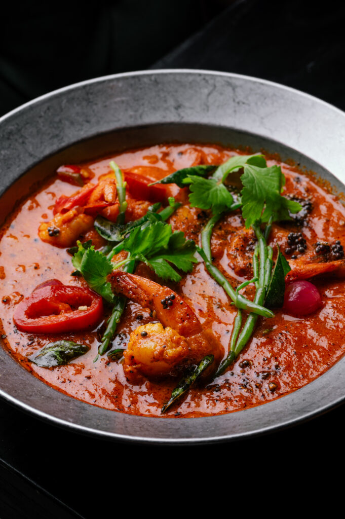 Kerala Canteen tasting menu in Leeds featuring Kerala tapas, curry bowl, dessert and prosecco