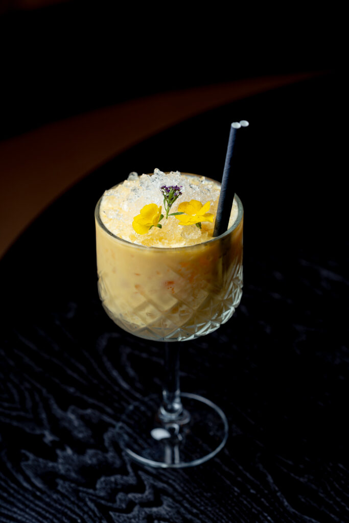 Crispy fried idli served in rich butternut sambhar with Mango Tango mocktail at Kerala Canteen Leeds