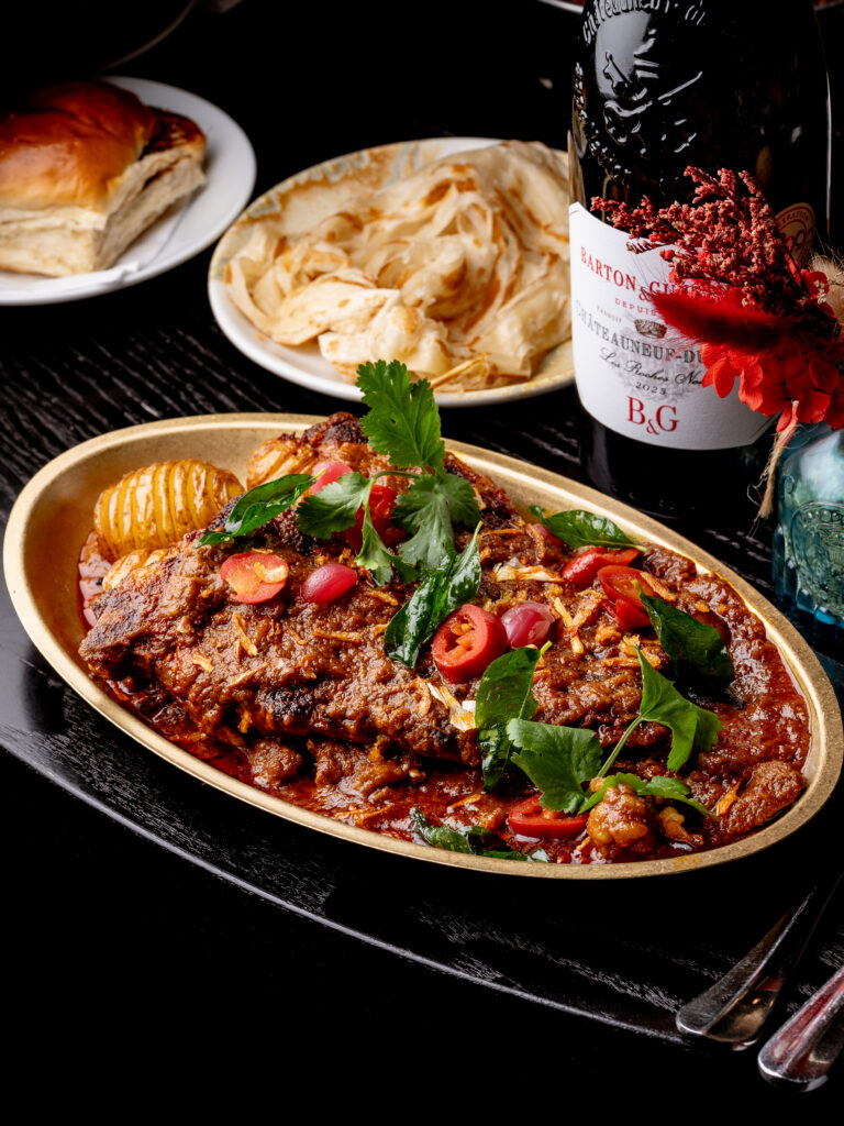 16oz slow-braised and grilled T-bone steak served with Kerala beef and bone marrow curry at Kerala Canteen Leeds