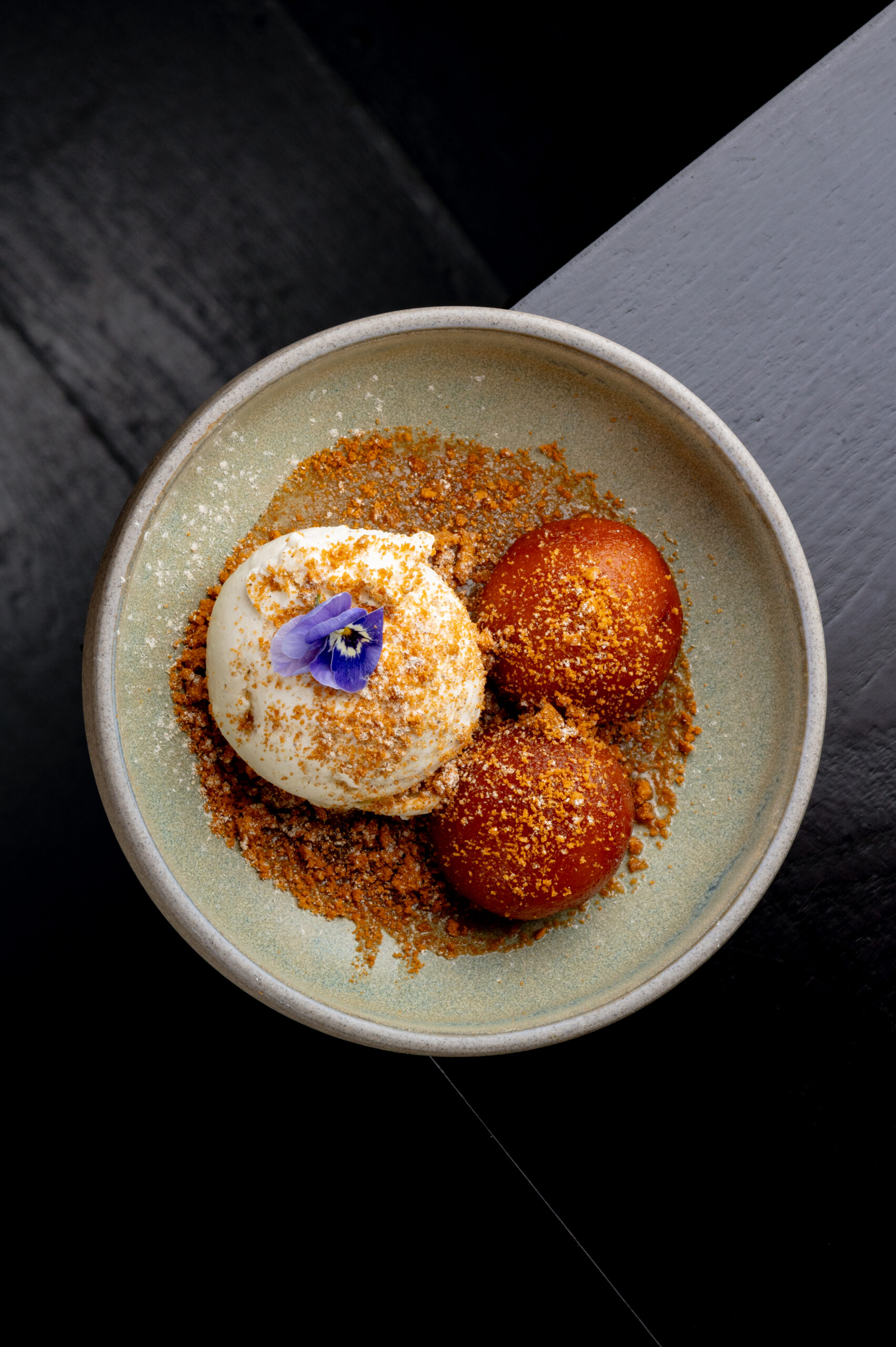 Biscoff Gulab Jamun and vanilla ice cream dessert at Kerala Canteen Leeds