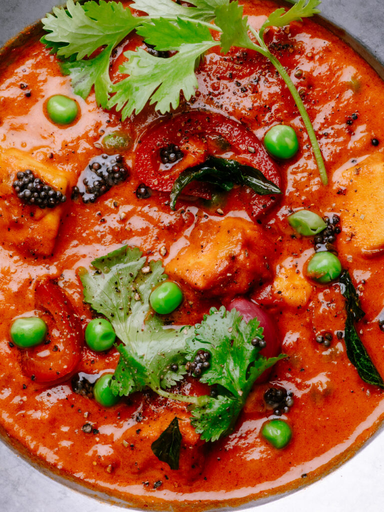Paneer and peas masala served in a creamy South Indian coconut curry at Kerala Canteen Leeds