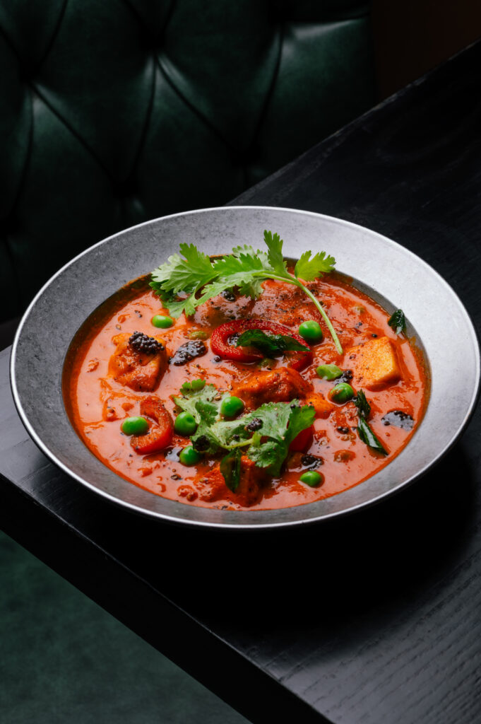 Paneer and peas masala served in a creamy South Indian coconut curry at Kerala Canteen Leeds