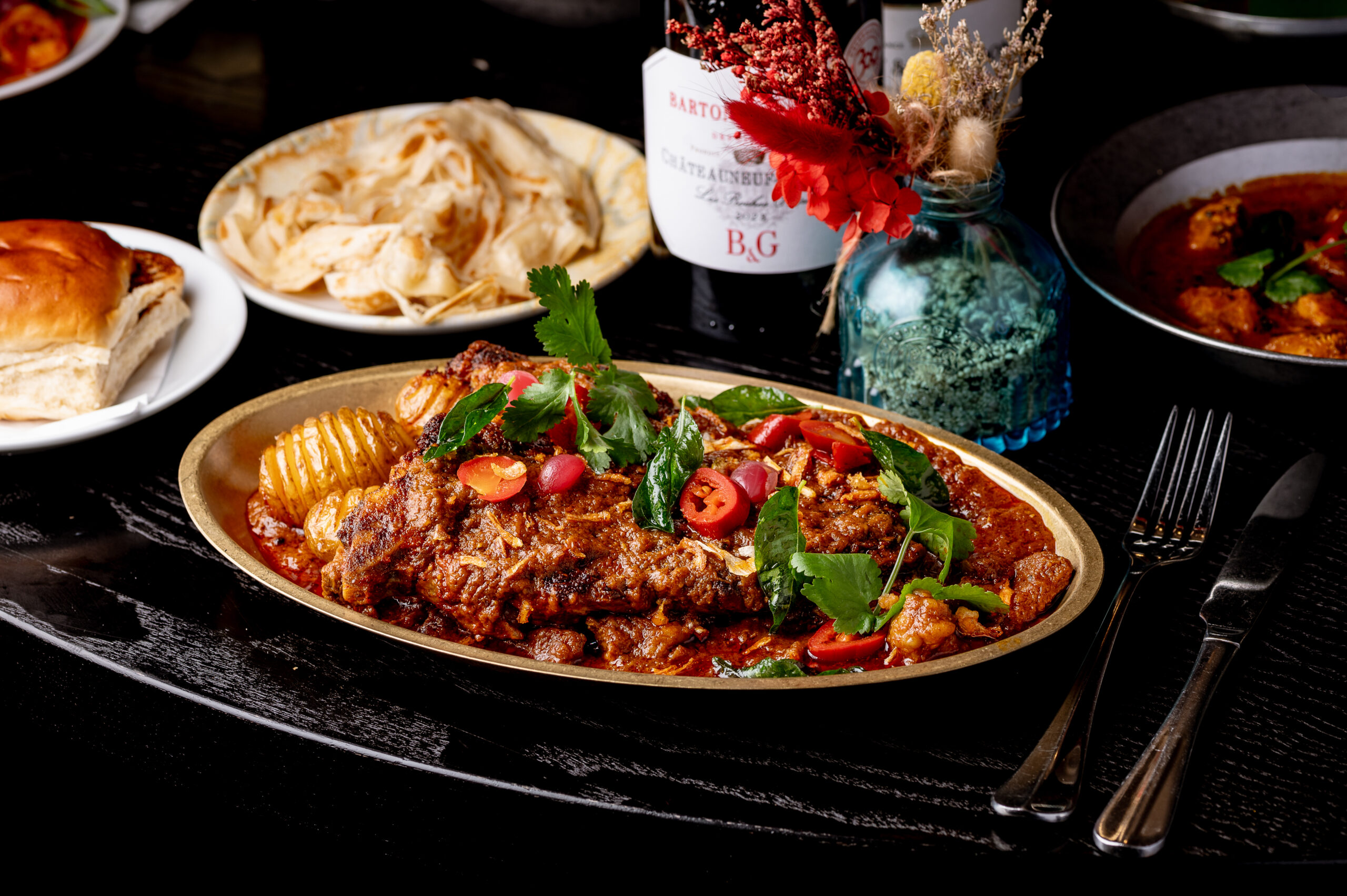 16 oz T-bone steak with beef and bone marrow curry at Kerala Canteen in Leeds